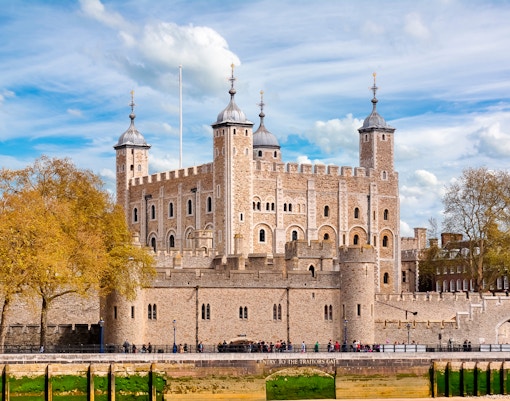 Tower of London with White Tower and medieval fortress walls, United Kingdom.