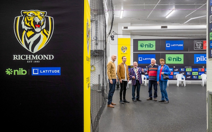 Richmond Football Club tour group in Melbourne sports facility.