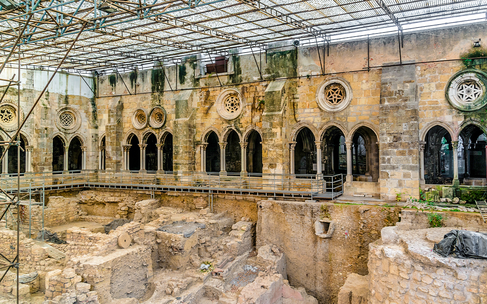Archaeological excavations at St Mary Major Cathedral in Lisbon, showcasing ancient stone structures.