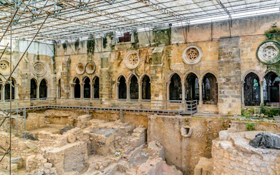Archaeological excavations at St Mary Major Cathedral in Lisbon, showcasing ancient stone structures.