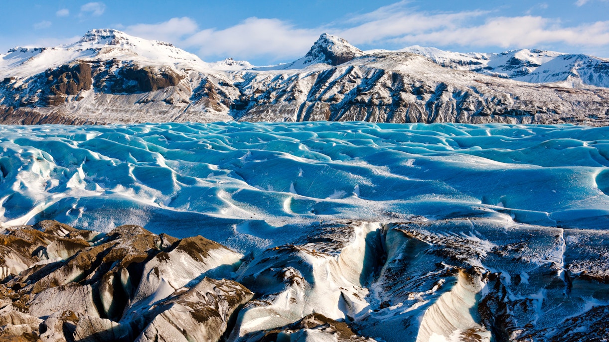 Svinafellsjokull glacier with snow-capped peaks in Skaftafell National Park, Southern Iceland.