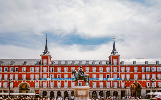 Plaza Mayor in Madrid with equestrian statue, part of Royal Palace of Madrid & Habsburgs Tour.