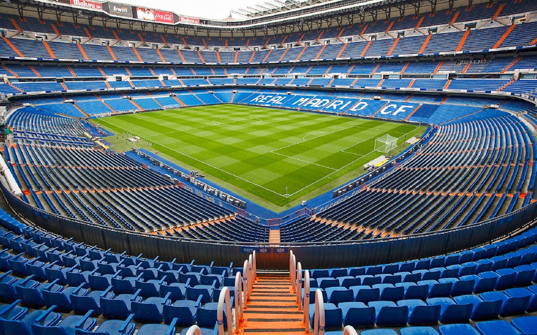 Santiago Bernabéu Stadium empty seats and field, Madrid, Spain.