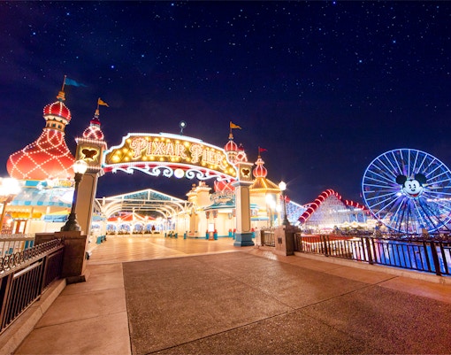Pixar Pier entrance and Mickey Ferris wheel at Disneyland Adventure Park, California.