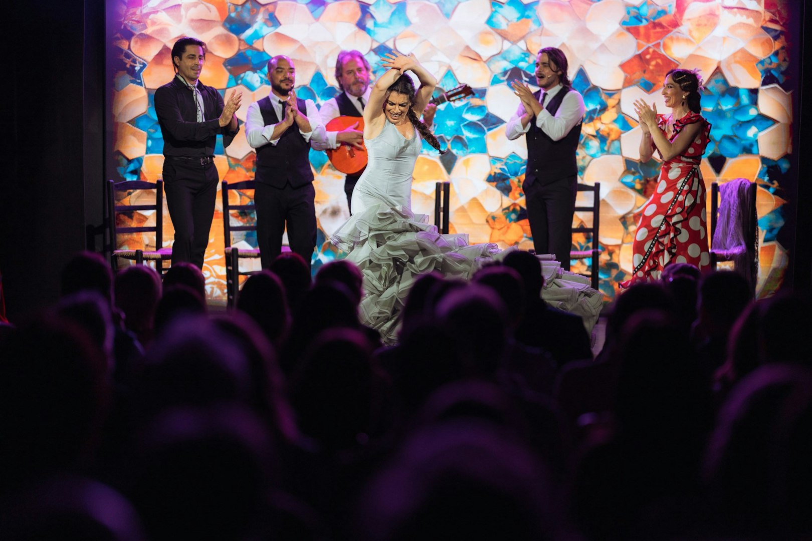 Flamenco dancers performing on stage at Teatro Flamenco Barcelona.