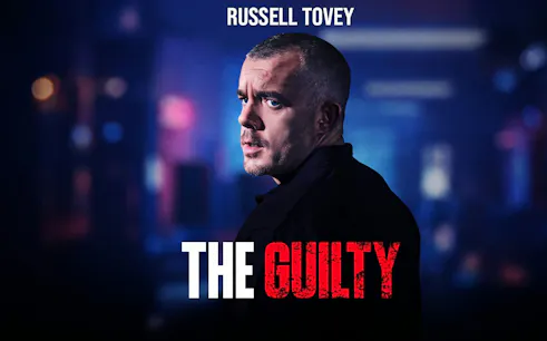 The Guilty" poster with a man in a dark setting, Westend.