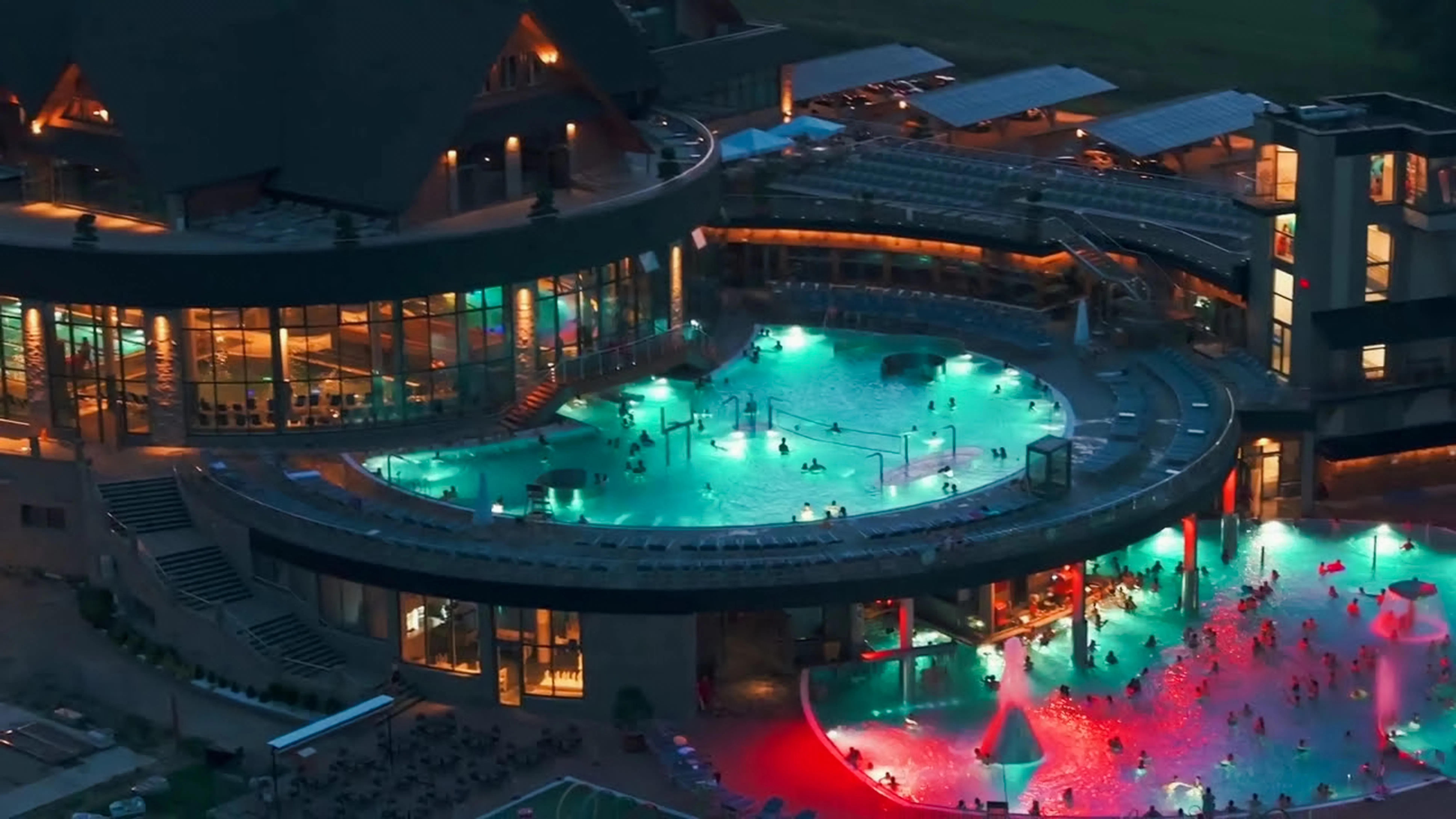 Thermal baths illuminated at night in Zakopane, part of a day trip from Krakow.