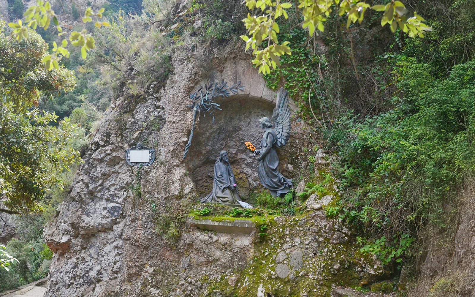 Statues of holy saint along the walkway of Montserrat.