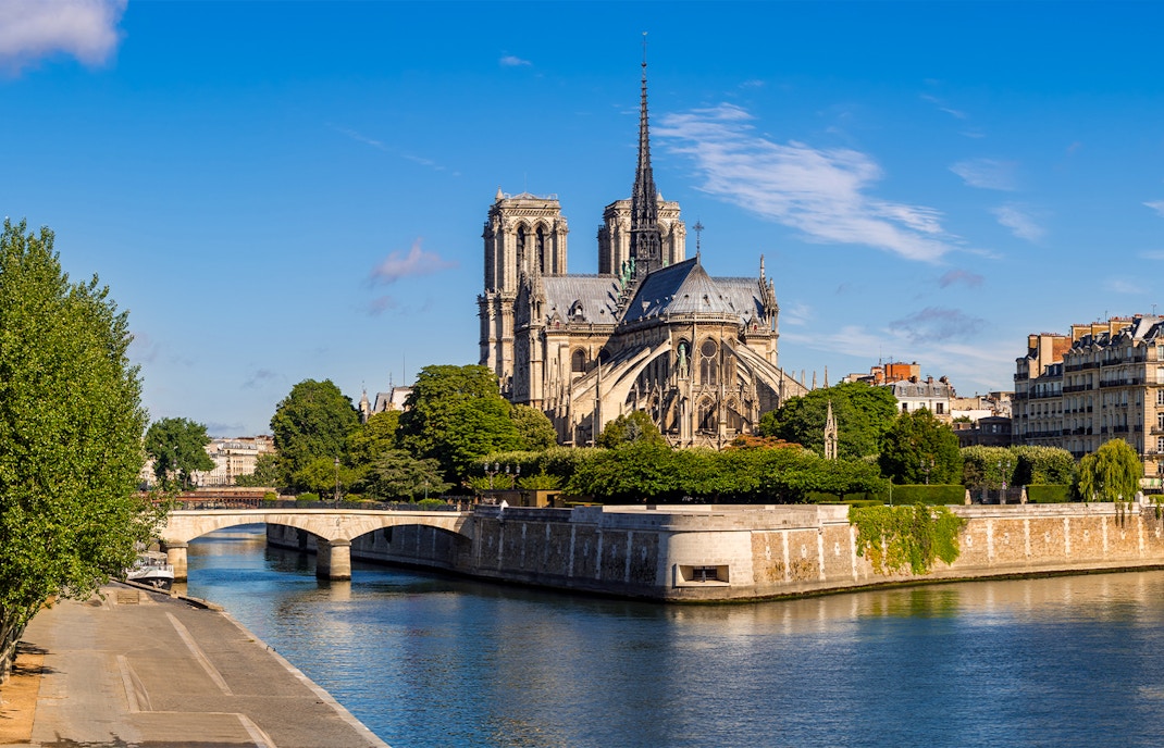 Notre Dame Cathedral facade on Ile de la Cite, Paris, France, during a walking tour.
