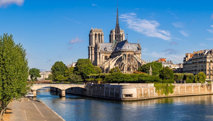 Notre Dame Cathedral facade on Ile de la Cite, Paris, France, during a walking tour.