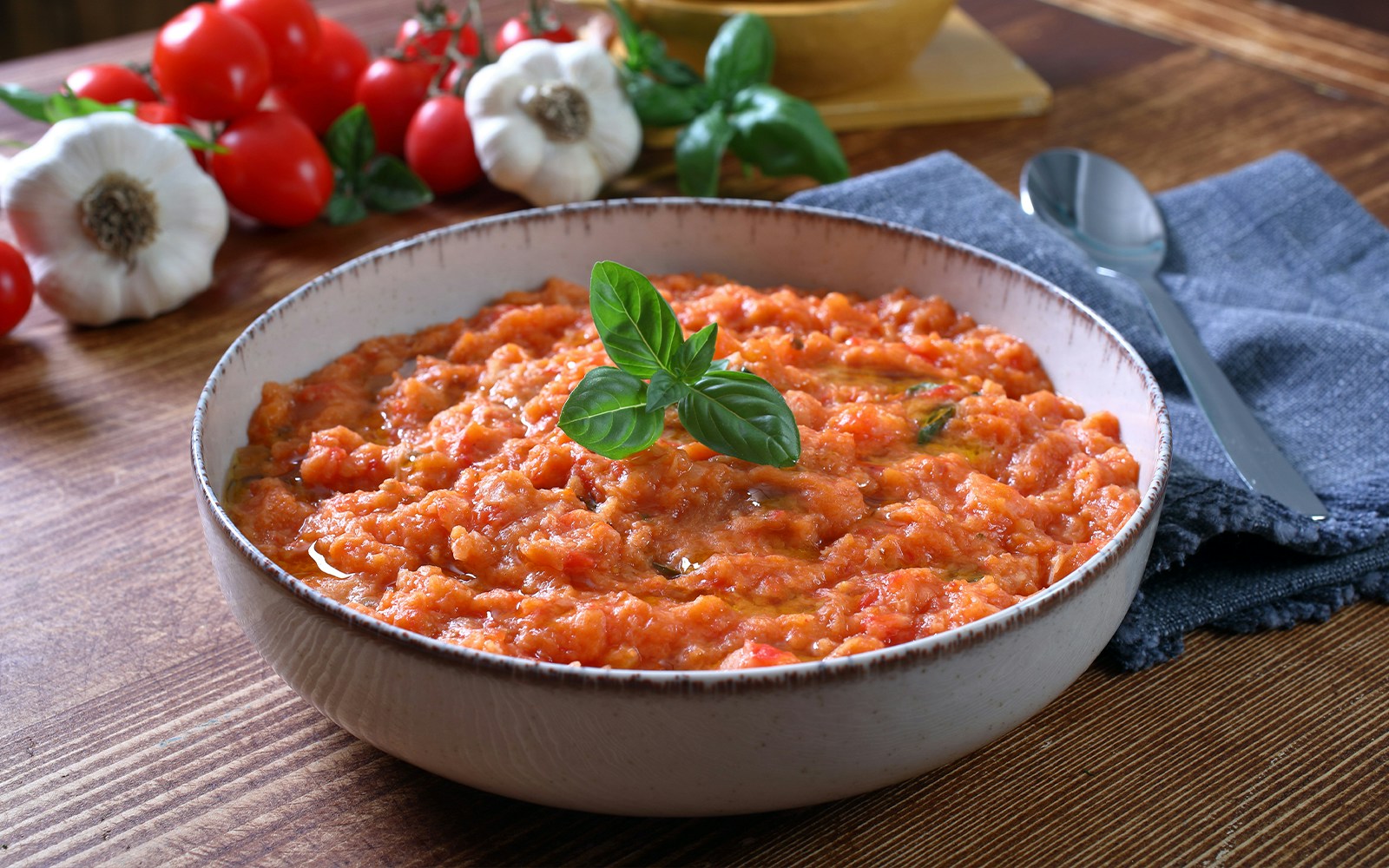 Pappa al Pomodoro dish served in a rustic Italian setting, showcasing traditional Tuscan cuisine.