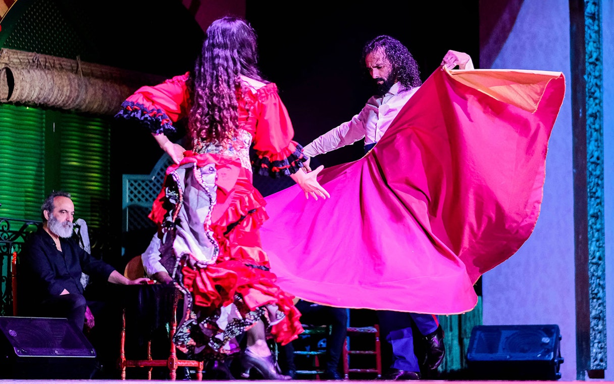 Flamenco dancers performing at El Palacio Andaluz in Seville.