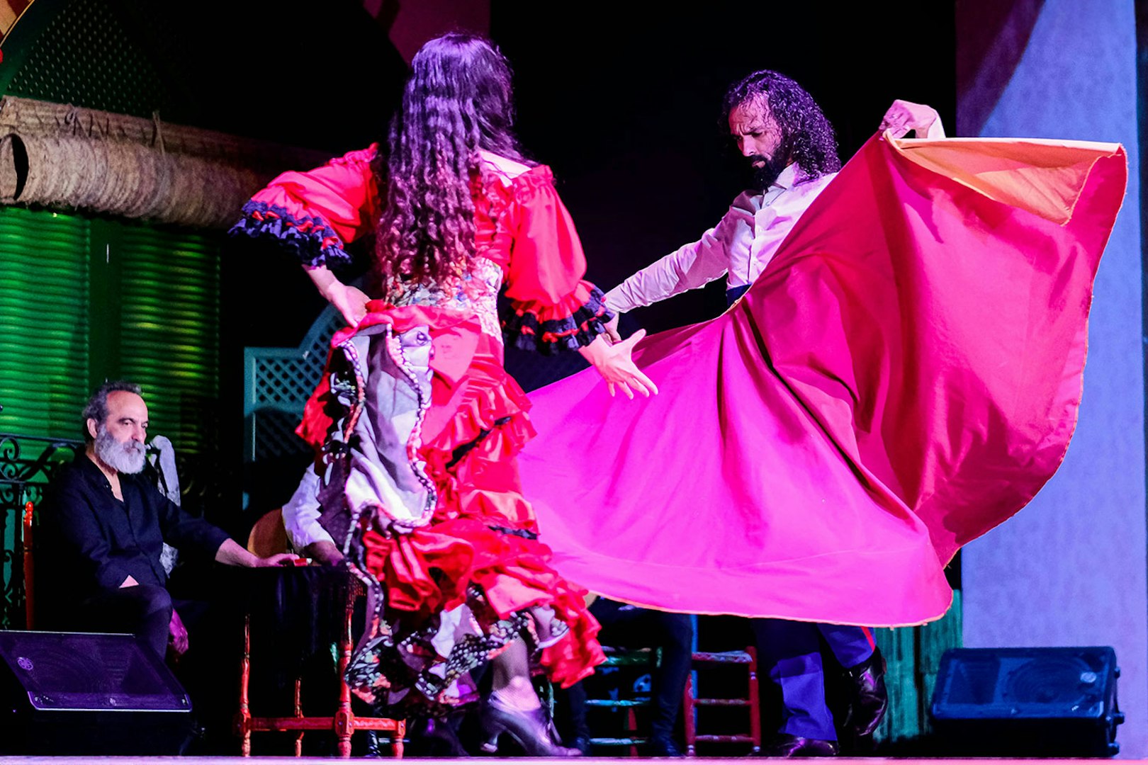 Flamenco dancers performing at El Palacio Andaluz in Seville.