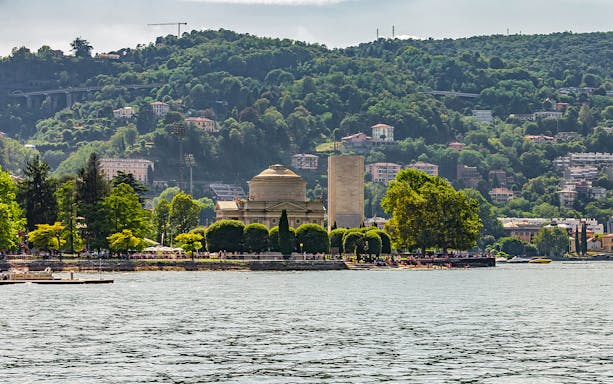 Lake Como public tour with view of Tempio Voltiano and lush hills.
