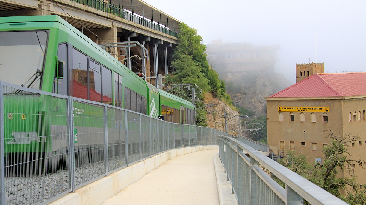 Sneak peak of montserrat rack railway on a foggy winter day