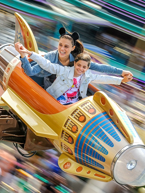 Visitors enjoying a ride at Disneyland Paris.