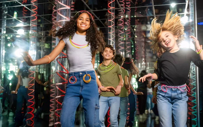 Kids enjoying the Mirror Maze at American Dream.