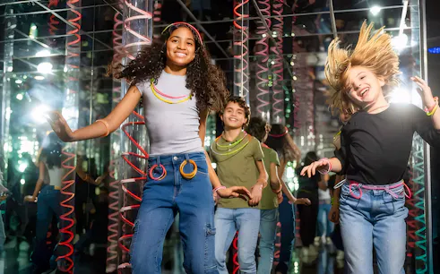 Kids enjoying the Mirror Maze at American Dream.