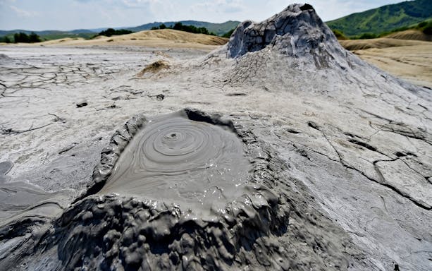 Mud volcano at Slanic Salt Mine day trip from Bucharest.