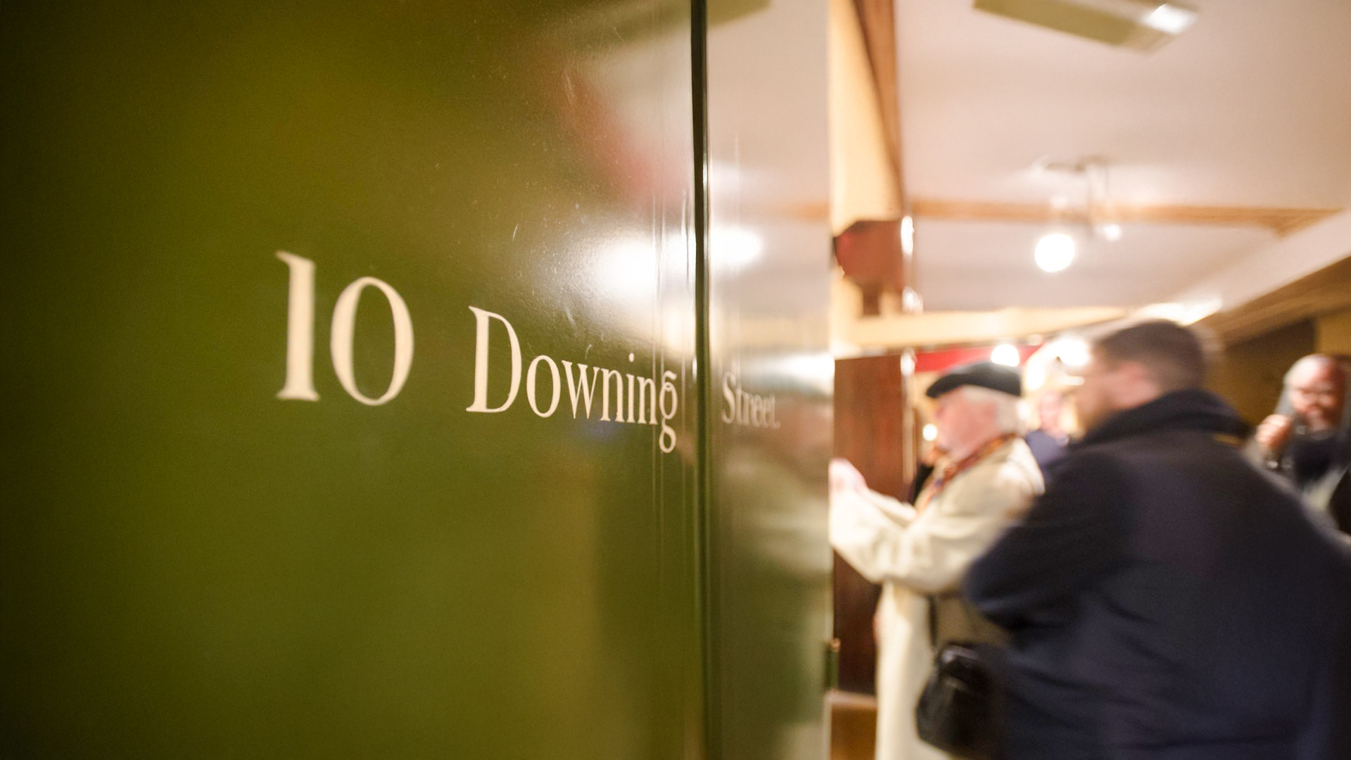 Guests gathered near the 10 Downing Street door in London.