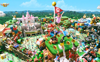 Super Nintendo World at Universal Studios Japan with Mario-themed attractions and excited visitors.
