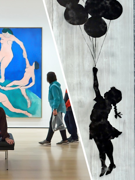 Visitors viewing art at MoMA and Banksy Museum, New York City.