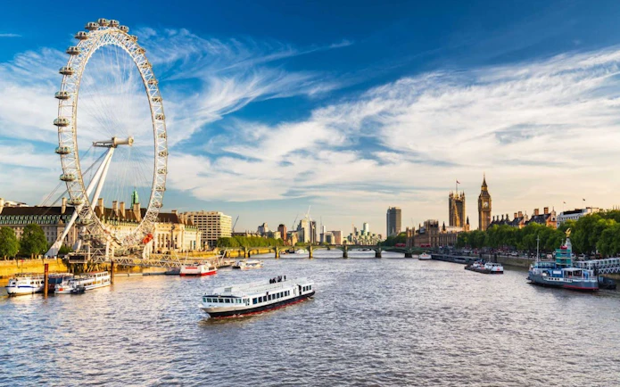 London Eye and Thames River view during Christmas Lights Afternoon Tea Bus Tour.