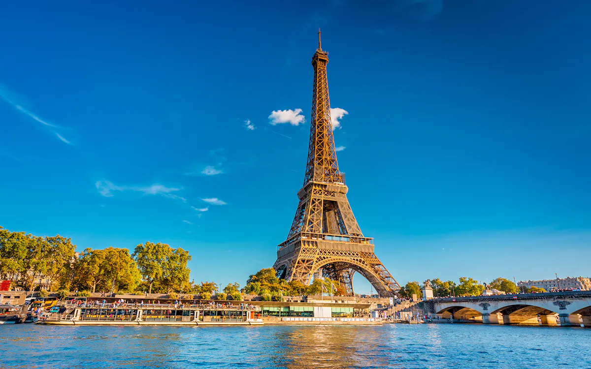 View of the Eiffel Tower from a Seine river cruise boat, Paris