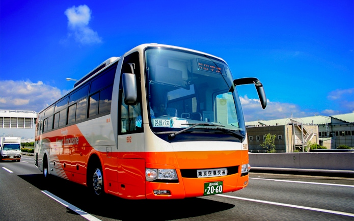 Limousine bus driving through Central Tokyo from Haneda Airport.