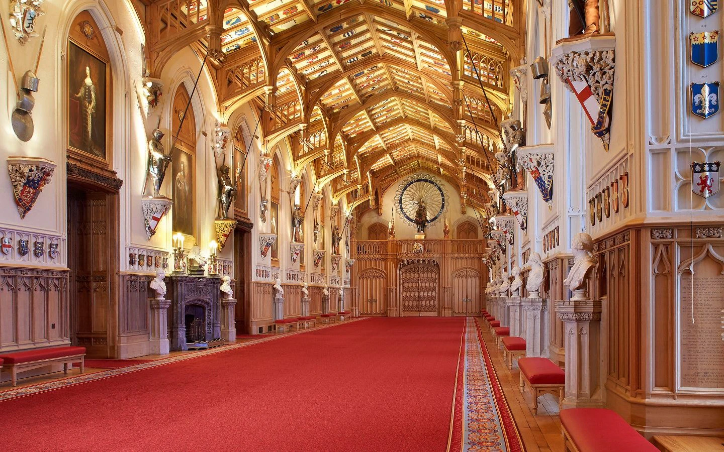 St George's Hall interior at Windsor Castle, featuring ornate ceiling and historical armor displays.