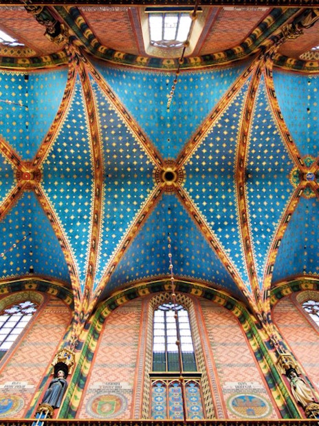 Ceiling of Saint Mary's Basilica in Krakow's Old Town, featuring intricate blue and gold patterns.