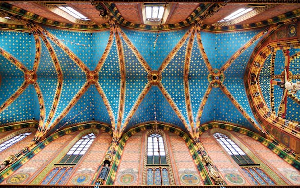 Ceiling of Saint Mary's Basilica in Krakow's Old Town, featuring intricate blue and gold patterns.