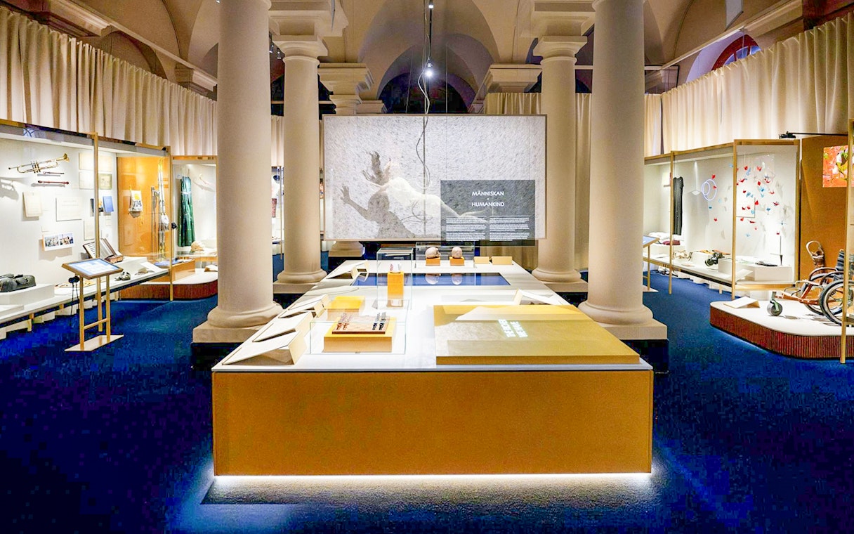 Exhibit hall at the Nobel Prize Museum showcasing historical artifacts and displays.
