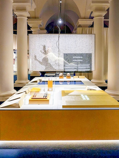 Exhibit hall at the Nobel Prize Museum showcasing historical artifacts and displays.