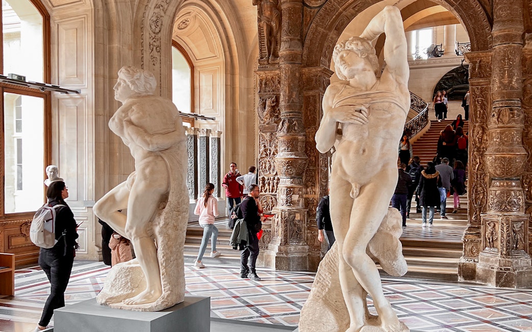 The Dying Slave and Rebellious Slave sculptures at Louvre Museum, Paris.