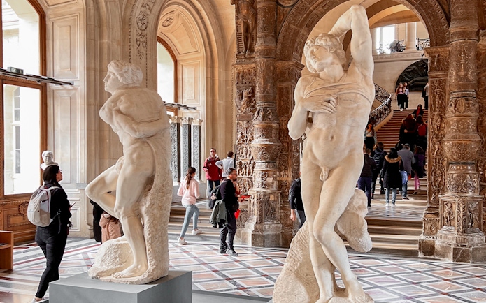 The Dying Slave and Rebellious Slave sculptures at Louvre Museum, Paris.