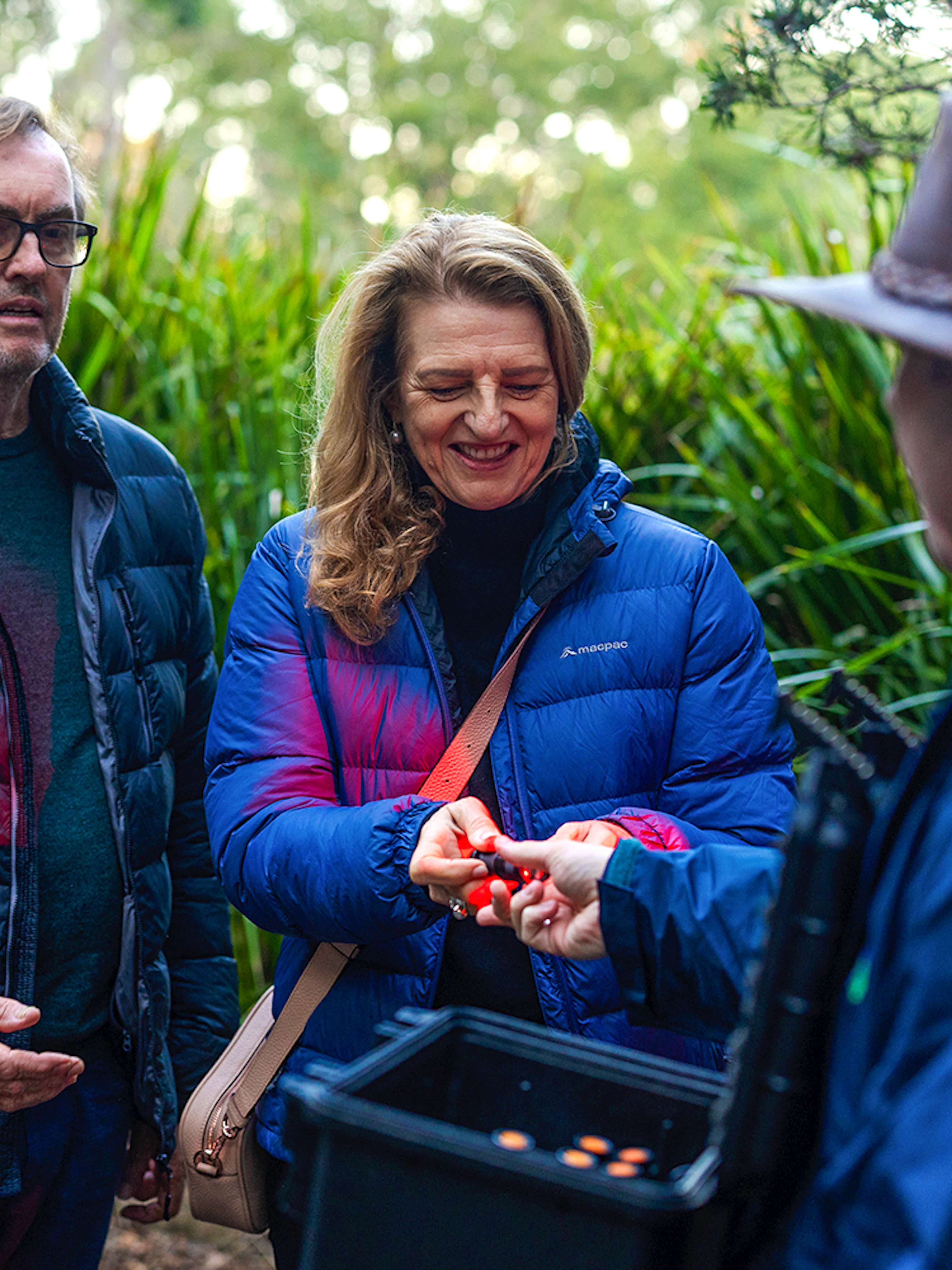 Tour group receiving instructions for Evening Rainforest & Glow Worm Experience.