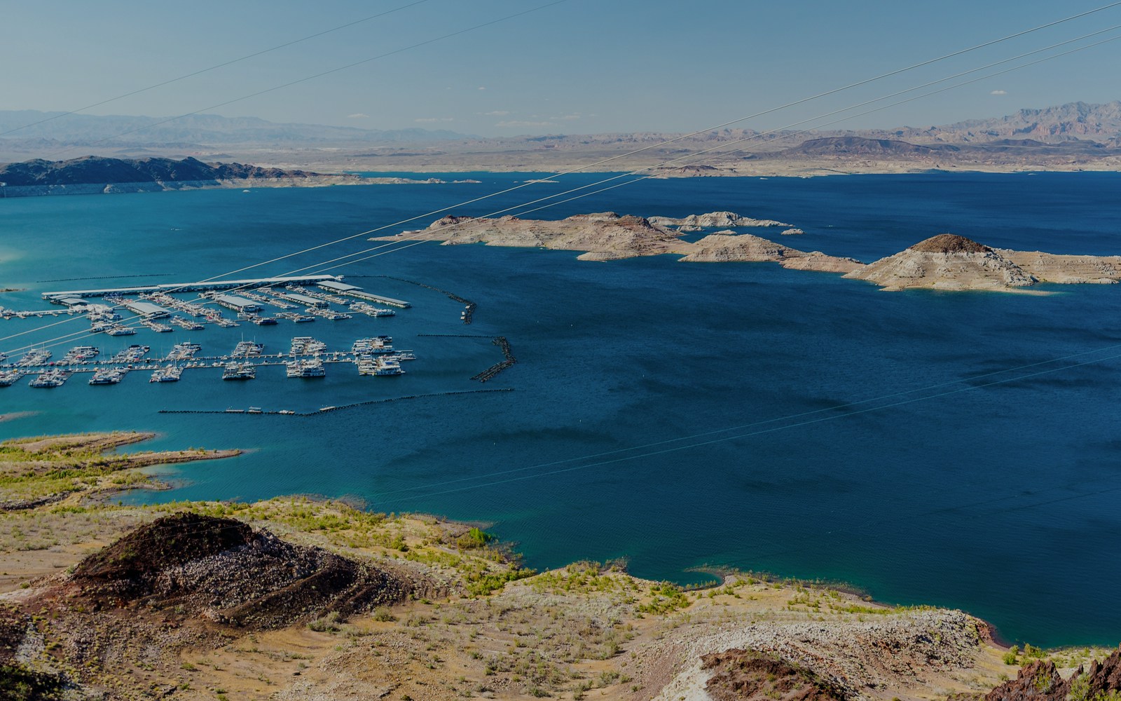 Lake Mead marina with boats and docks viewed from a high vantage point.