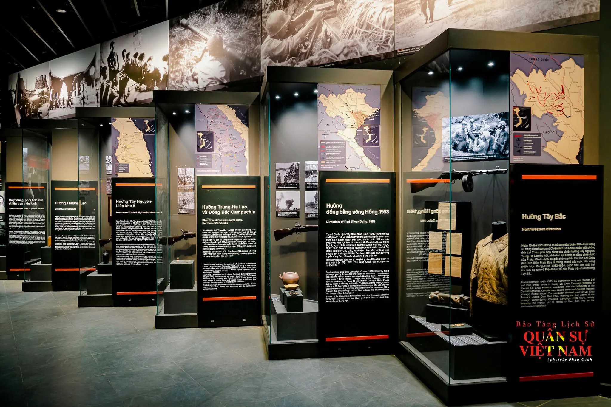 Hanoi Military History Museum exhibit with maps and historical artifacts.