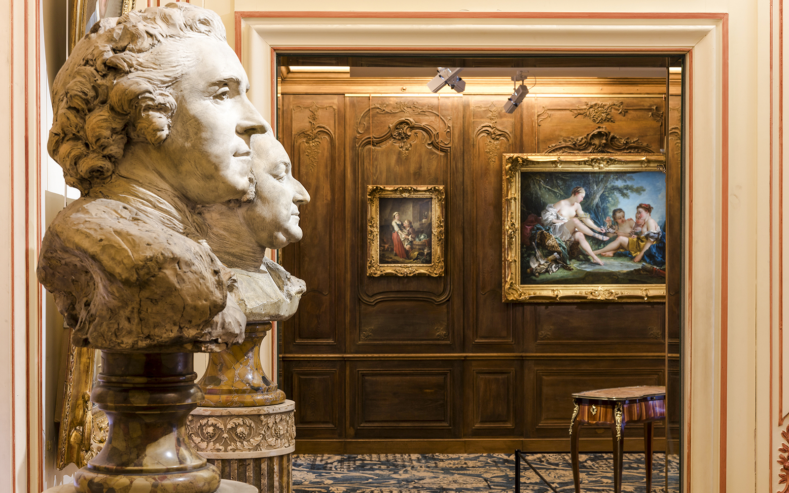 Busts and paintings in the Cognacq Museum interior exhibit.