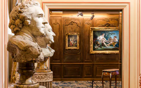 Busts and paintings in the Cognacq Museum interior exhibit.
