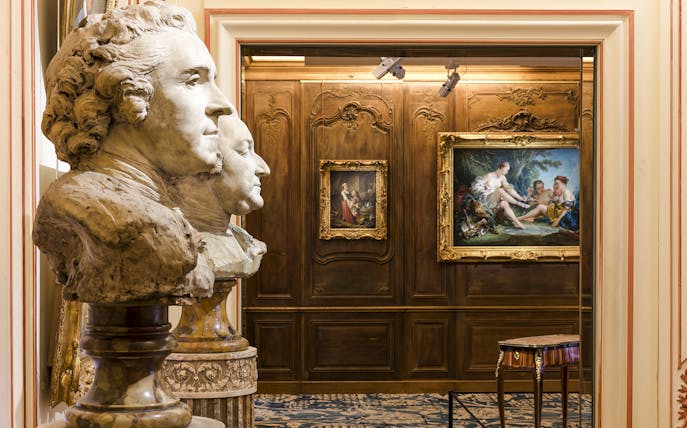 Busts and paintings in the Cognacq Museum interior exhibit.