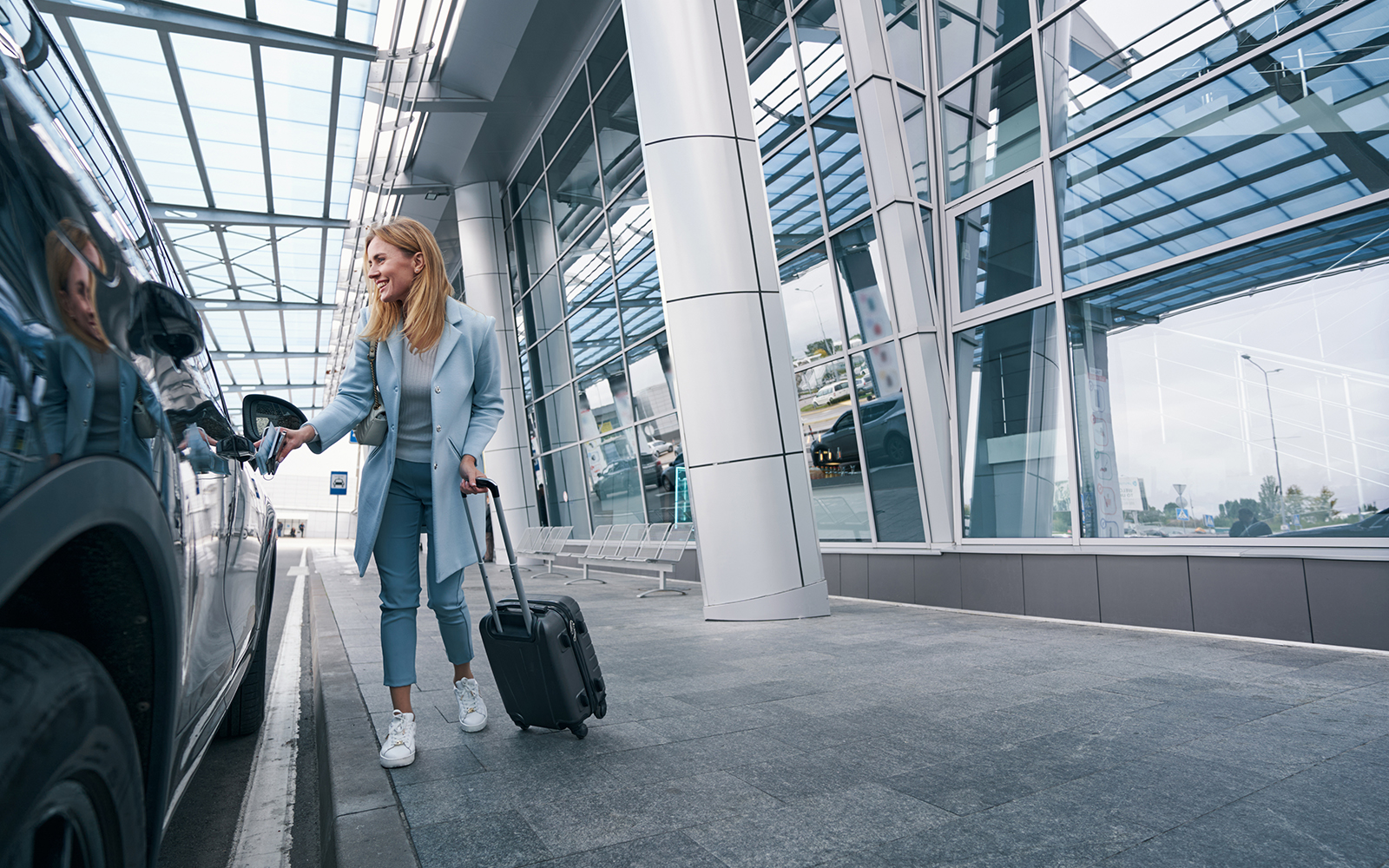 woman getting in the car