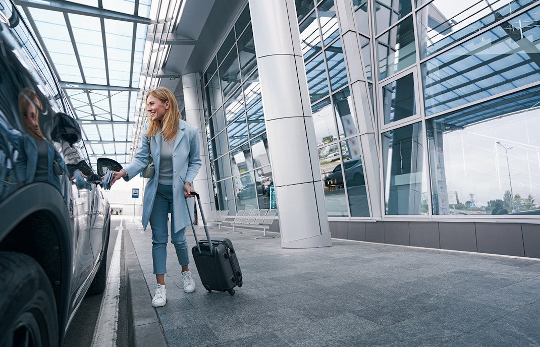 woman getting in the car