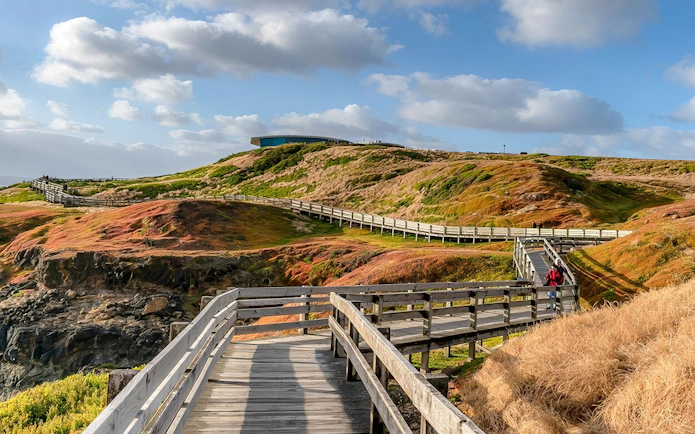 Boardwalk through scenic landscape on Phillip Island, Australia, part of Penguin Parade tour.