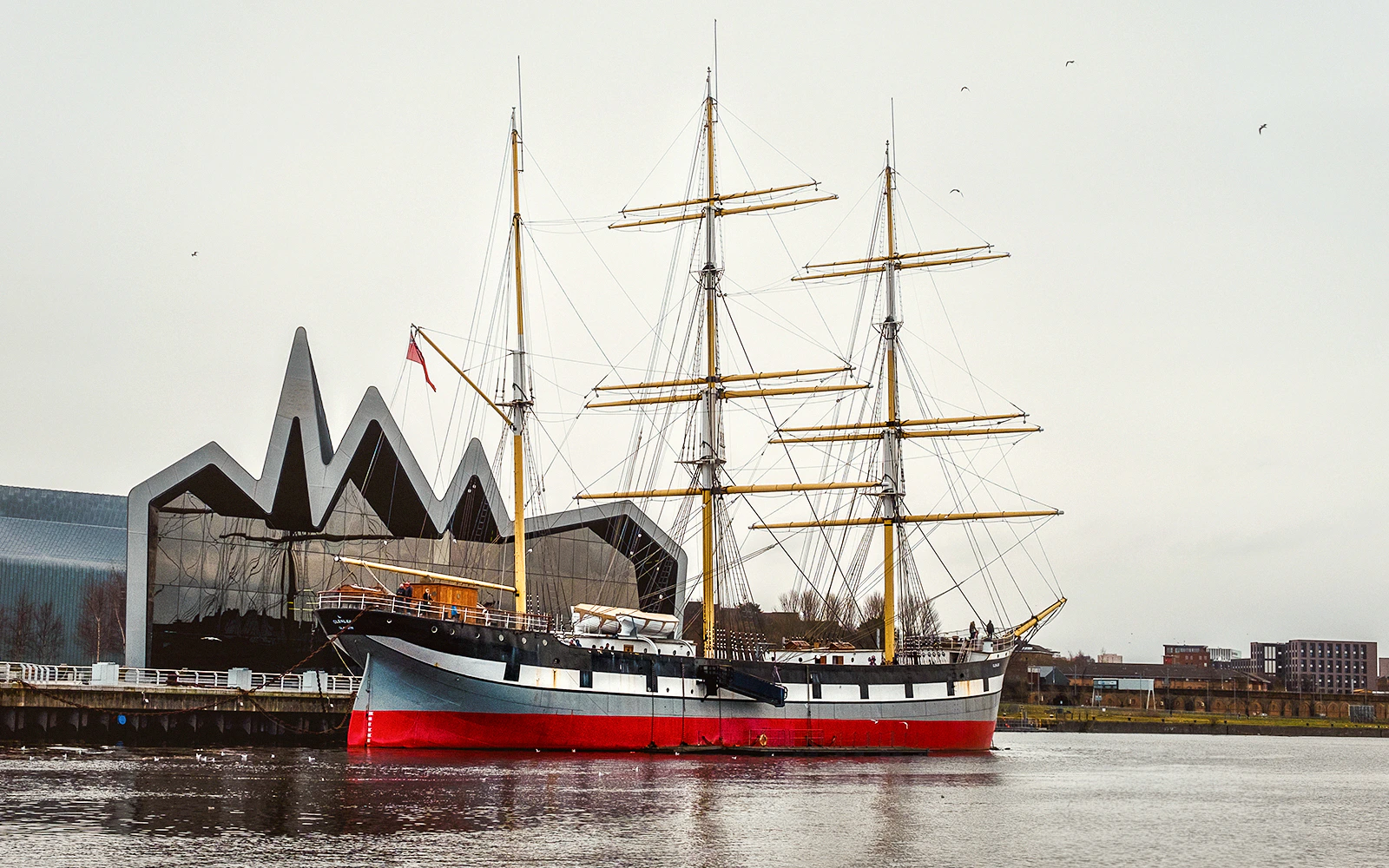 Tall ship moored by the Riverside Museum in Glasgow, Scotland.