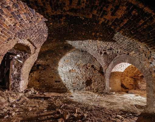 Krakow's historic lost wawel with stone walls and arched ceilings.