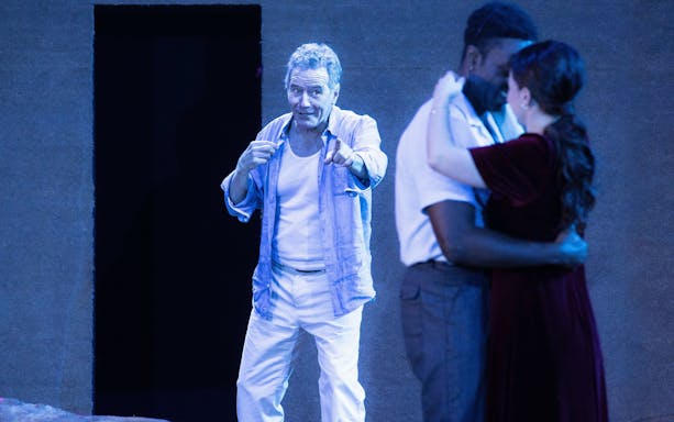 Actors performing a scene in "All My Sons" West End show.