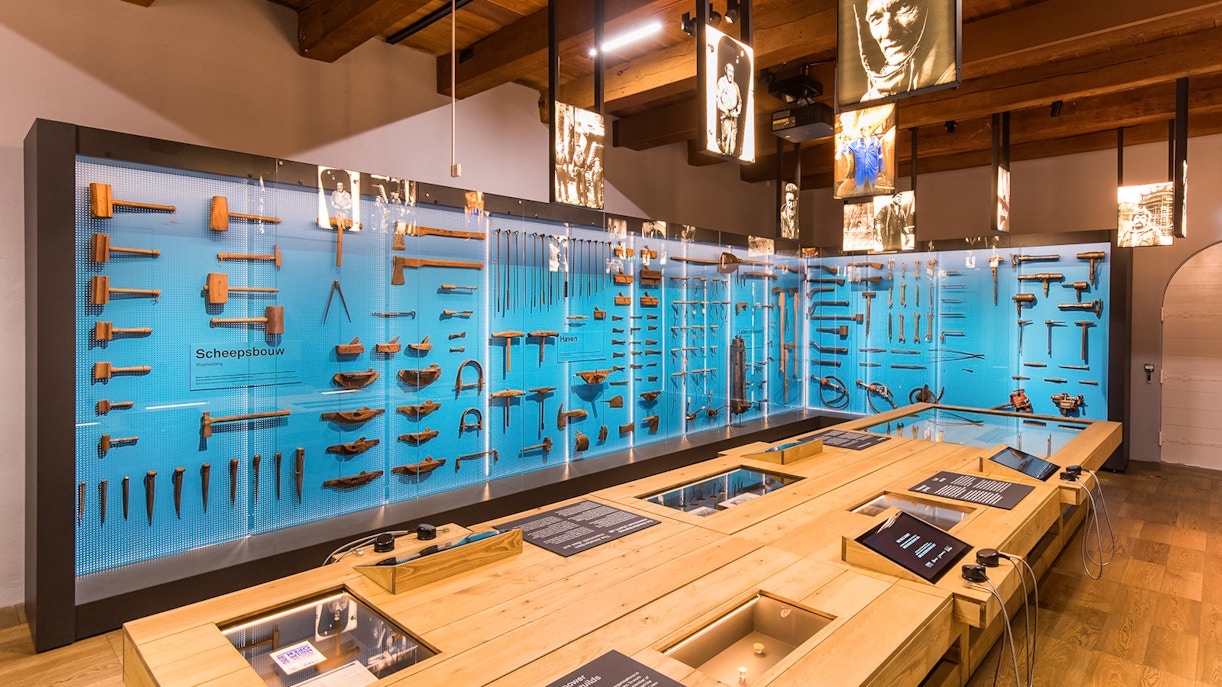 Maritime Museum Amsterdam exhibit featuring historical ship models and navigational instruments.