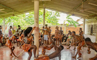 Traditional dance and music performance by locals in San Basilio de Palenque.